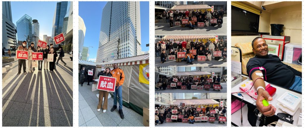 JR大阪駅前での献血推進キャンペーンにて、教え子やボランティアスタッフと笑顔で活動するにしゃんた。献血推進20年の活動風景。